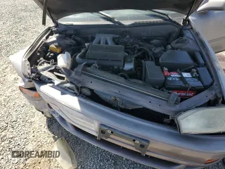 1994 Toyota Camry LE z VIN JT2GK12E6R0055565, wystawiony jako Copart lot #54031255 z przebiegiem 240 841 mil mil oraz Szkoda całkowita • Salvage title. Historia ofert i sprzedaży dostępna na DreamBid. Obrazek 11.