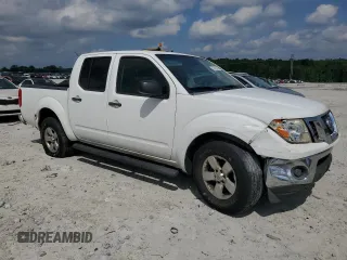 2009 Nissan Frontier SE with VIN 1N6AD07U19C411546, listed as a Copart auction lot 57683625 with 216,492 mi miles and Salvage title. Bid and sale history available at DreamBid. Image 4.