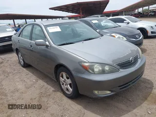 2003 Toyota Camry LE with VIN JTDBE32K530236769, listed as a IAAI auction lot 42250783 with 194,445 mi miles and . Bid and sale history available at DreamBid. Image 1.