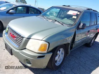 2003 GMC Envoy SLT with VIN 1GKDS13S432373988, listed as a IAAI auction lot 41840744 with 221,306 mi miles. Bid and sale history available at carsss.com. Image 6.