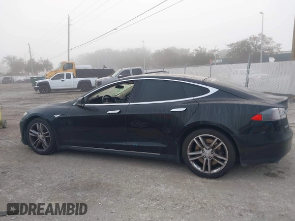 2015 Tesla Model S 85D with VIN 5YJSA1E24FF111120, listed as a IAAI auction lot 41471698 with 58,126 mi miles. Bid and sale history available at carsss.com. Image 15.
