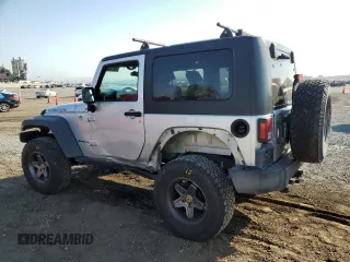 2009 Jeep Wrangler Rubicon with VIN 1J4GA64149L757121, listed as a Copart auction lot 74258934 with 73,241 mi miles and Salvage Title. Bid and sale history available at DreamBid. Image 2.