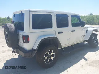 2021 Jeep Wrangler Unlimited Rubicon with VIN 1C4HJXFG5MW586842, listed as a IAAI auction lot 42186683 with 76,450 mi miles and . Bid and sale history available at DreamBid. Image 4.