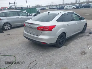 2015 Ford Focus SE with VIN 1FADP3F29FL258781, listed as a IAAI auction lot 41963223 with 121,286 mi miles and . Bid and sale history available at DreamBid. Image 4.