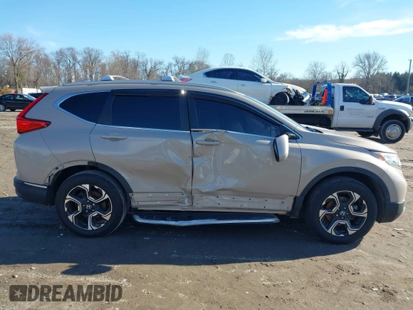 2017 Honda CR-V Touring with VIN 5J6RW2H94HL013536, listed as a IAAI auction lot 41577317 with 97,132 mi miles. Bid and sale history available at carsss.com. Image 13.