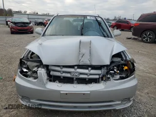2004 Hyundai Accent GL with VIN KMHCG45C94U564176, listed as a Copart auction lot 82963944 with 454,400 mi miles and Salvage Title. Bid and sale history available at carsss.com. Image 5.