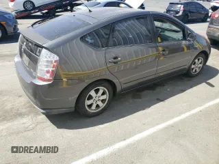 2007 Toyota Prius z VIN JTDKB20U373216659, wystawiony jako Copart lot #60930375 z przebiegiem 155 283 mil mil oraz Czysty tytuł • Clean title. Historia ofert i sprzedaży dostępna na DreamBid. Obrazek 3.