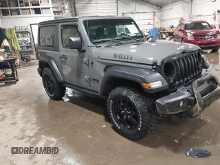 2021 Jeep Wrangler Sport S with VIN 1C4GJXAN7MW647786, listed as a IAAI auction lot 41685775 with 31,907 mi miles and . Bid and sale history available at DreamBid. Image 1.