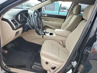 2014 Jeep Grand Cherokee Laredo with VIN 1C4RJFAG3EC354877, listed as a Copart auction lot 49895145 with 174,035 mi miles and Salvage Title. Bid and sale history available at carsss.com. Image 7.