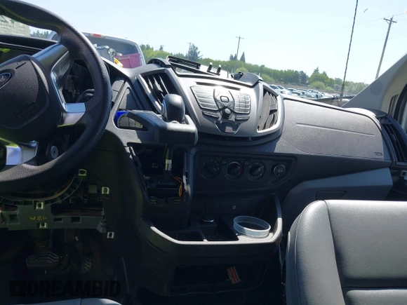 2015 Ford Transit Passenger XL z VIN 1FBAX2CG7FKA75719, wystawiony jako IAAI lot #42135118 z przebiegiem Nie podano mil oraz . Historia ofert i sprzedaży dostępna na DreamBid. Obrazek 6.
