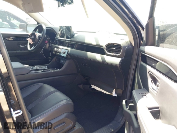 2024 Honda Pilot Touring z VIN 5FNYG1H70RB032368, wystawiony jako IAAI lot #41805758 z przebiegiem 13 078 mil mil oraz . Historia ofert i sprzedaży dostępna na DreamBid. Obrazek 5.