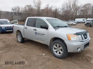 2012 Nissan Titan S with VIN 1N6AA0EJXCN310874, listed as a IAAI auction lot 42022787 with 162,317 mi miles. Bid and sale history available at carsss.com. Image 1.