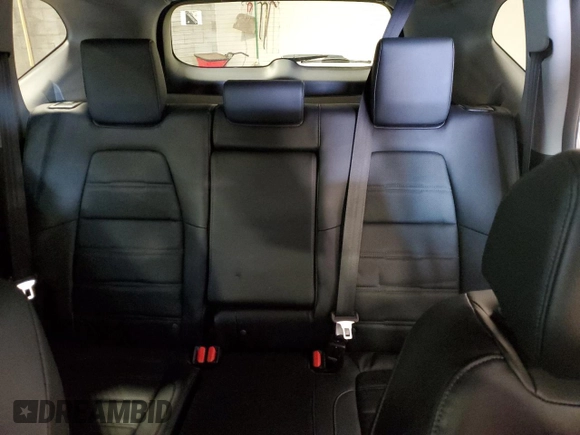 2018 Honda CR-V Touring z VIN 7FARW2H95JE012947, wystawiony jako Copart lot #64779925 z przebiegiem 20 561 mil mil oraz Szkoda całkowita • Salvage title. Historia ofert i sprzedaży dostępna na DreamBid. Obrazek 10.