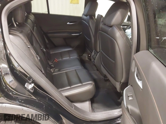 2020 Cadillac XT4 AWD Sport with VIN 1GYFZFR43LF090264, listed as a IAAI auction lot 41261586 with 65,859 mi miles and . Bid and sale history available at DreamBid. Image 8.