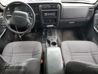 2000 Jeep Cherokee with VIN 1J4FF48SXYL198290, listed as a Copart auction lot 66026705 with 201,409 mi miles and Clean title. Bid and sale history available at DreamBid. Image 8.