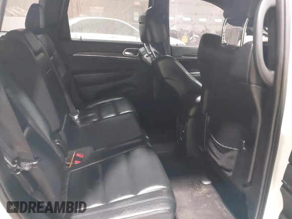 2018 Jeep Grand Cherokee Limited with VIN 1C4RJFBGXJC475110, listed as a IAAI auction lot 41858278 with 117,811 mi miles and . Bid and sale history available at DreamBid. Image 8.