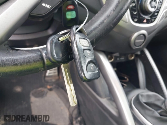 2013 Hyundai Veloster w/Gray Int with VIN KMHTC6AD2DU141462, listed as a IAAI auction lot 42136445 with 122,146 mi miles and . Bid and sale history available at DreamBid. Image 11.