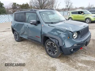 2015 Jeep Renegade Trailhawk z VIN ZACCJBCT4FPB79254, wystawiony jako IAAI lot #41965451 z przebiegiem 87 398 mil mil oraz . Historia ofert i sprzedaży dostępna na DreamBid. Obrazek 1.
