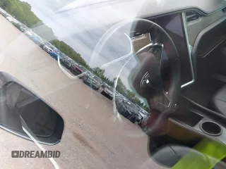 2013 Tesla Model S с VIN 5YJSA1CN1DFP08848, выставлен на аукционе IAAI как лот 42300243 с пробегом Не указан миль и . История ставок и продаж доступна на DreamBid. Изображение 7.