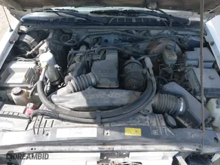 1998 GMC Sonoma with VIN 1GTCS1443W8543587, listed as a IAAI auction lot 41810870 with 164,342 mi miles. Bid and sale history available at carsss.com. Image 10.