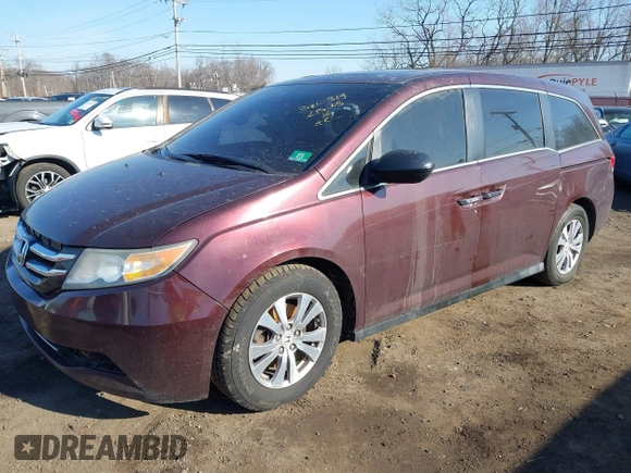 2014 Honda Odyssey EX-L with VIN 5FNRL5H60EB009083, listed as a IAAI auction lot 41633419 with 219,930 mi miles and . Bid and sale history available at carsss.com. Image 2.