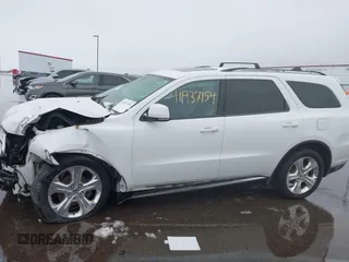 2015 Dodge Durango Limited with VIN 1C4RDJDG1FC826646, listed as a IAAI auction lot 41937154 with 132,543 mi miles and . Bid and sale history available at DreamBid. Image 14.