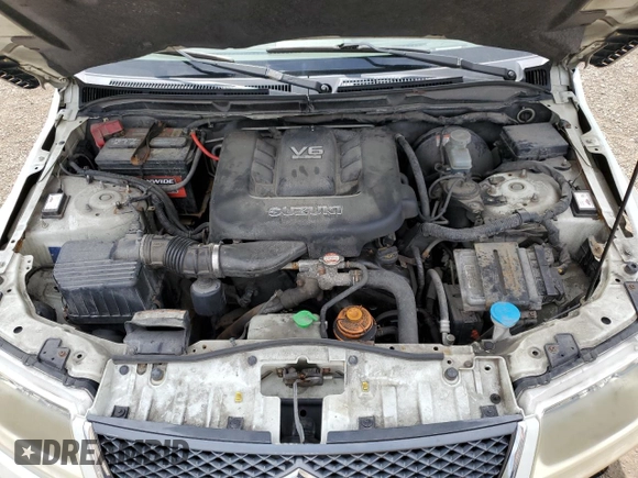 2008 Suzuki Grand Vitara Luxury z VIN JS3TD947884103329, wystawiony jako Copart lot #68764444 z przebiegiem 207 151 mil mil oraz Szkoda całkowita • Salvage title. Historia ofert i sprzedaży dostępna na DreamBid. Obrazek 12.