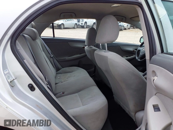 2009 Toyota Corolla with VIN 1NXBU40E49Z086415, listed as a IAAI auction lot 39773955 with 203,803 mi miles and . Bid and sale history available at DreamBid. Image 8.