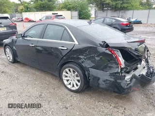 2014 Cadillac CTS AWD z VIN 1G6AW5SX4E0129136, wystawiony jako IAAI lot #42364098 z przebiegiem 137 080 mil mil oraz . Historia ofert i sprzedaży dostępna na DreamBid. Obrazek 3.