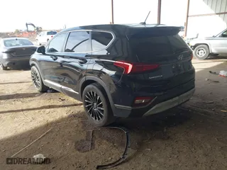 2019 Hyundai Santa Fe SE with VIN 5NMS23AD1KH112931, listed as a IAAI auction lot 41678592 with 96,477 mi miles. Bid and sale history available at carsss.com. Image 3.