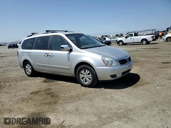2012 Kia Sedona LX with VIN KNDMG4C72C6445242, listed as a Copart auction lot 54164455 with 143,124 mi miles and Salvage Title. Bid and sale history available at carsss.com. Image 14.