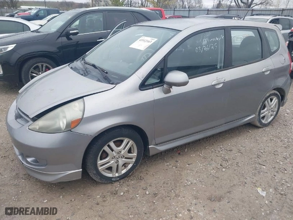 2007 Honda Fit Sport with VIN JHMGD38647S015658, listed as a IAAI auction lot 41912163 with 153,000 mi miles. Bid and sale history available at carsss.com. Image 2.