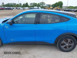 2023 Ford Mustang Mach-E Select with VIN 3FMTK1SS1PMA09157, listed as a IAAI auction lot 42350857 with 13,057 mi miles and . Bid and sale history available at DreamBid. Image 15.