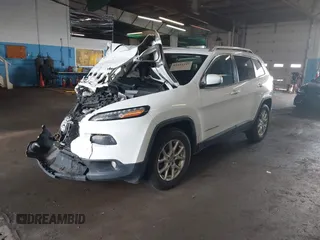 2015 Jeep Cherokee Latitude with VIN 1C4PJMCBXFW784869, listed as a IAAI auction lot 41951297 with 138,396 mi miles. Bid and sale history available at carsss.com. Image 17.