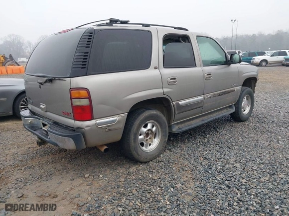 2001 GMC Yukon SLT with VIN 1GKEC13T31J110744, listed as a IAAI auction lot 41481084 with 1 mi miles. Bid and sale history available at carsss.com. Image 4.