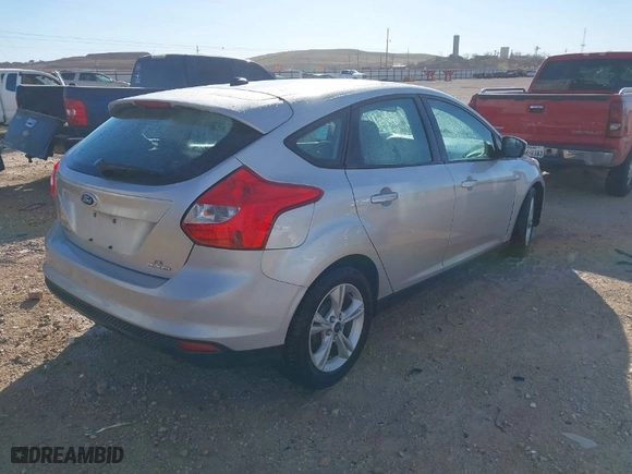 2014 Ford Focus SE with VIN 1FADP3K24EL430641, listed as a IAAI auction lot 41791968 with 112,976 mi miles. Bid and sale history available at carsss.com. Image 4.