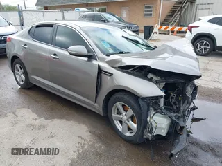 2015 Kia Optima LX z VIN 5XXGM4A78FG382856, wystawiony jako IAAI lot #42170669 z przebiegiem 101 964 mil mil oraz . Historia ofert i sprzedaży dostępna na DreamBid. Obrazek 1.