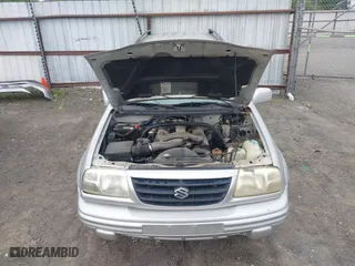 2000 Suzuki Grand Vitara JLX with VIN JS3TD62V5Y4117740, listed as a IAAI auction lot 42088696 with 166,484 mi miles. Bid and sale history available at carsss.com. Image 10.