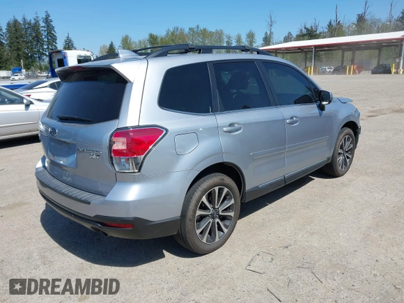 2018 Subaru Forester Touring with VIN JF2SJGWC0JH523099, listed as a IAAI auction lot 42034873 with 25,763 mi miles. Bid and sale history available at carsss.com. Image 4.