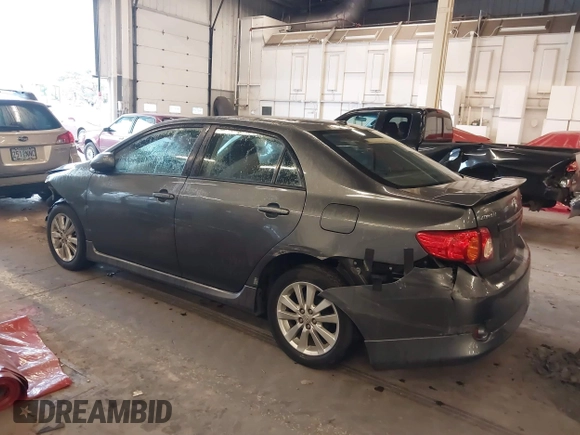 2010 Toyota Corolla with VIN 2T1BU4EE8AC510757, listed as a IAAI auction lot 41589152 with 164,857 mi miles. Bid and sale history available at carsss.com. Image 3.