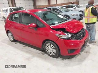 2015 Honda Fit LX z VIN 3HGGK5H50FM760278, wystawiony jako IAAI lot #42329692 z przebiegiem 129 950 mil mil oraz . Historia ofert i sprzedaży dostępna na DreamBid. Obrazek 1.