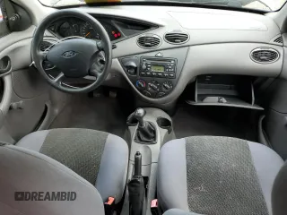 2004 Ford Focus LX with VIN 1FAFP33P24W148563, listed as a Copart auction lot 63869755 with 142,243 mi miles and Salvage title. Bid and sale history available at DreamBid. Image 8.