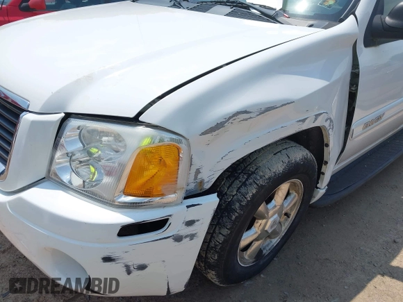 2004 GMC Envoy SLT with VIN 1GKET16S646135986, listed as a IAAI auction lot 42420464 with 132,741 mi miles and . Bid and sale history available at DreamBid. Image 6.