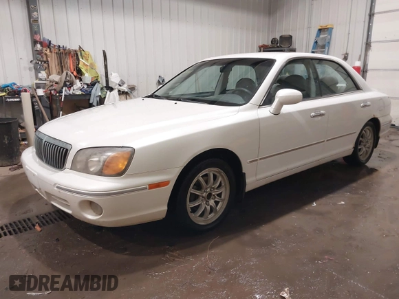 2002 Hyundai XG L z VIN KMHFU45EX2A180204, wystawiony jako IAAI lot #41472564 z przebiegiem 148 333 mil mil oraz . Historia ofert i sprzedaży dostępna na DreamBid. Obrazek 2.