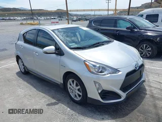 2017 Toyota Prius One z VIN JTDKDTB31H1594528, wystawiony jako IAAI lot #42272661 z przebiegiem 154 791 mil mil oraz . Historia ofert i sprzedaży dostępna na DreamBid. Obrazek 1.