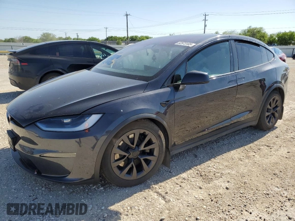 2023 Tesla Model X with VIN 7SAXCDE5XPF422163, listed as a Copart auction lot 52573185 with Not Provided miles and Salvage Title. Bid and sale history available at DreamBid. Image 1.