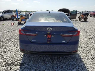 2025 Toyota Camry LE with VIN 4T1DAACK0SU075581, listed as a Copart auction lot 54570525 with 2,329 mi miles and Non Repairable. Bid and sale history available at DreamBid. Image 6.