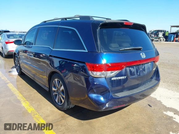 2016 Honda Odyssey Touring Elite with VIN 5FNRL5H98GB083221, listed as a IAAI auction lot 41626604 with 145,341 mi miles and . Bid and sale history available at DreamBid. Image 3.