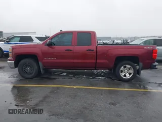 2014 Chevrolet Silverado 1500 LT with VIN 1GCVKRECXEZ296266, listed as a IAAI auction lot 41606586 with 233,832 mi miles and . Bid and sale history available at DreamBid. Image 14.