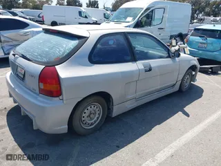 1996 Honda Civic DX with VIN 2HGEJ6442TH127790, listed as a IAAI auction lot 41976921 with 170,337 mi miles. Bid and sale history available at carsss.com. Image 4.